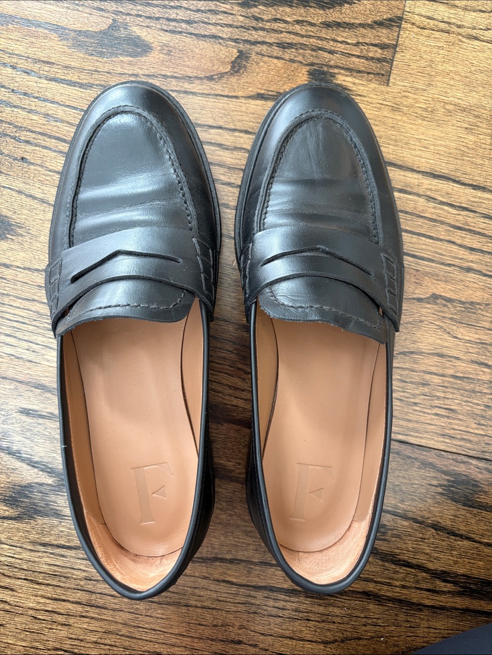 Flattered Black Leather Penny Loafers